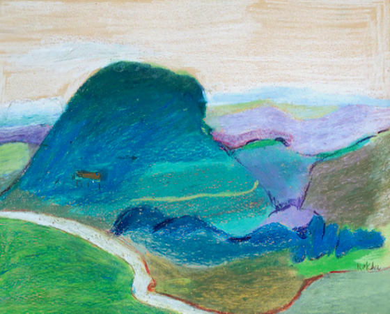 Landscape of curvy green hills of Rajasthan in the monsoon season and lush countryside below